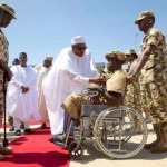 C-In-C President Buhari Decorates 3 Injured Soldiers With Purple Heart Ribbons