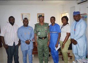 The Acting Director Defence Information, Brigadier General Onyema Nwachukwu (3rd Left), the Executive Director of Security Affairs Mr Austin Peacemaker with other members of his team.